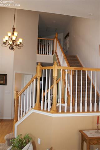 1055 Bowstring Road Monument, CO 80132 - Photo 8 of 22 Open Entry with Vaulted Ceilings.