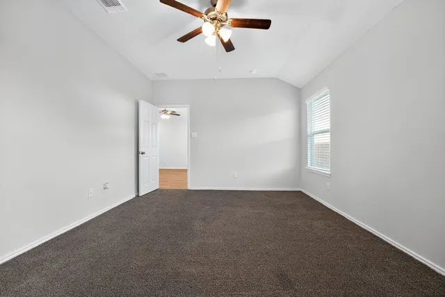 a bathroom with a toilet a sink and bathtub