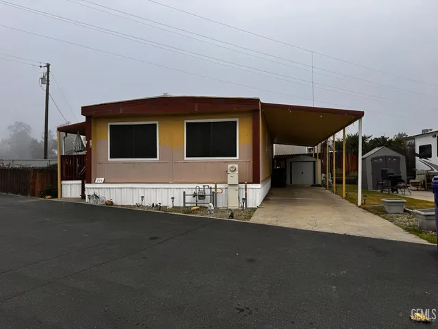 a front view of a house with a garage