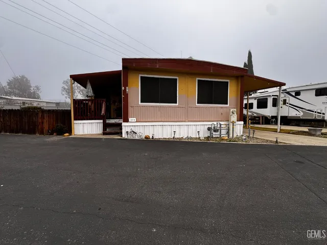 a view of a house with a street