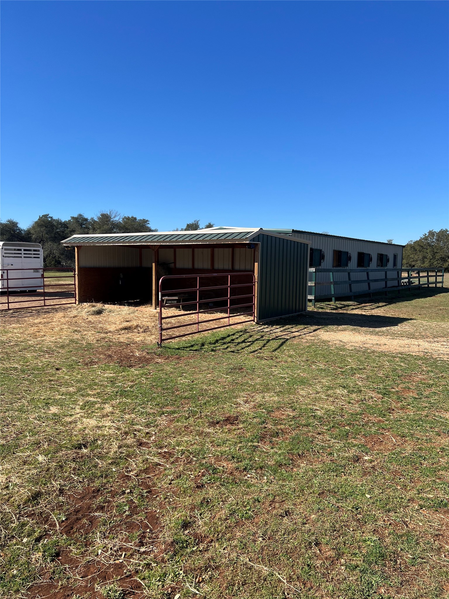 555 River Run Leander, TX 78641 - Photo 12 of 32 Run-in shed with ranch gates