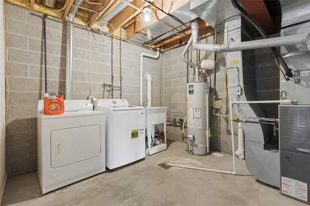 a utility room with dryer and washer