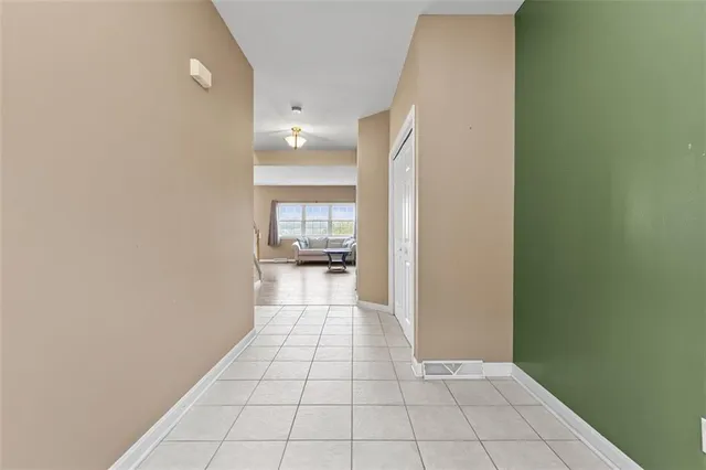 a view of a storage & utility room with a sink