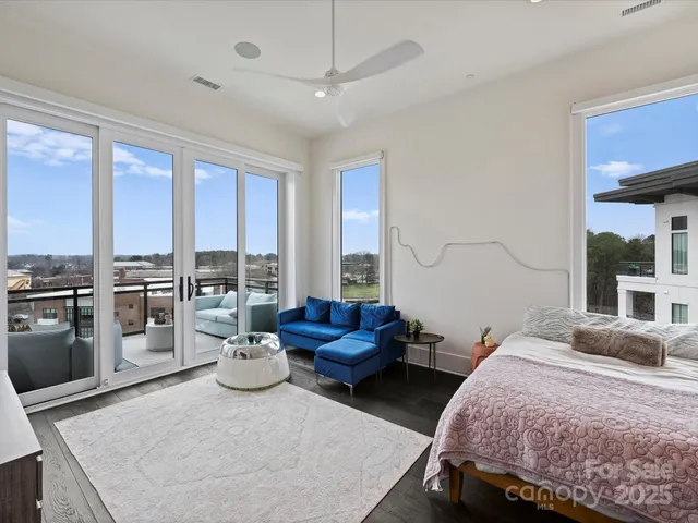 a bathroom with double vanity and a bathtub