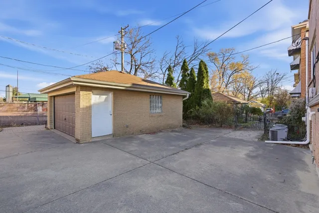 a view of a house with a garage