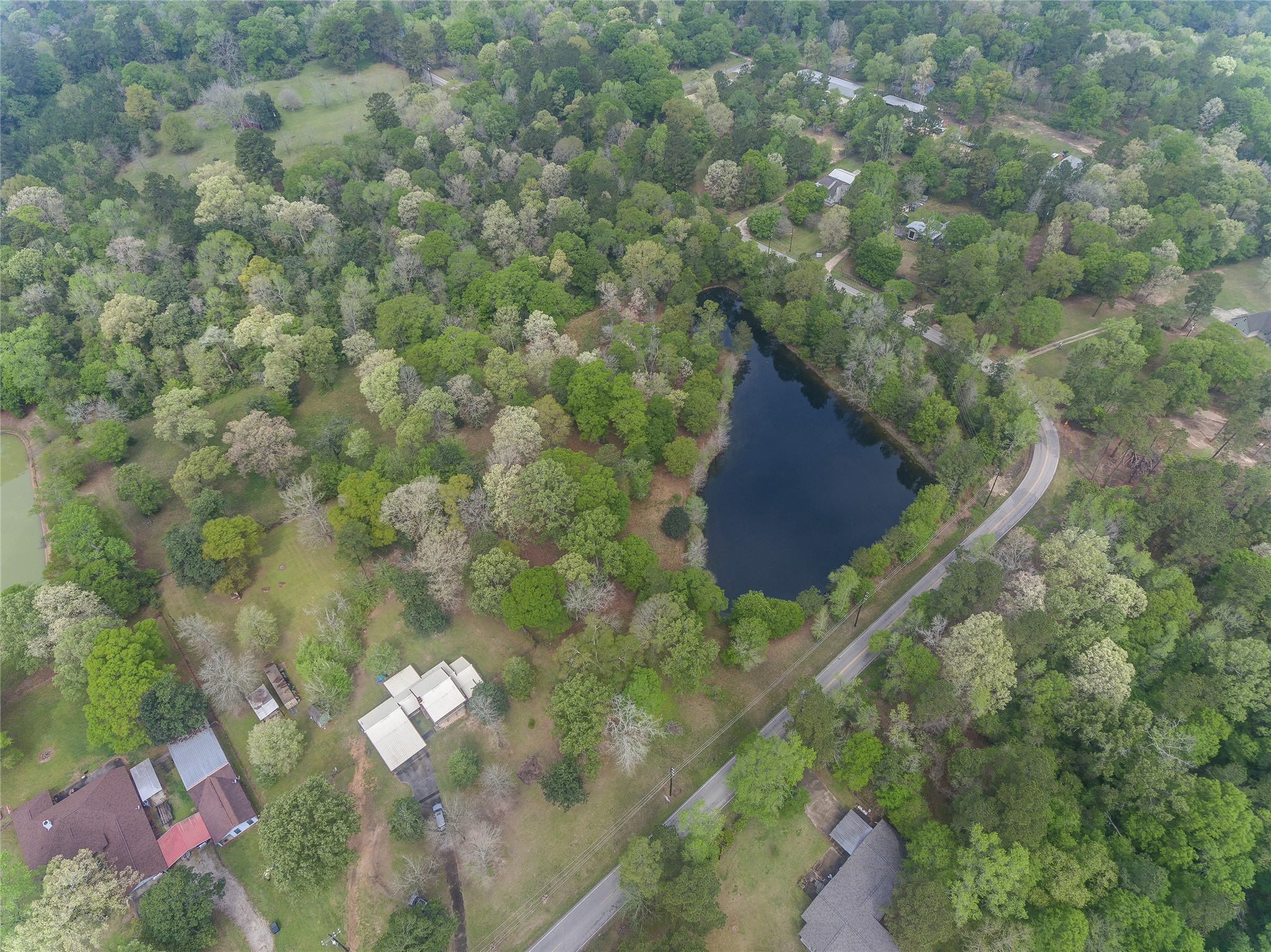 Tbd Tbd Firetower Road Conroe, TX 77306 - Photo 11 of 23 a backyard of a house with lots of green space