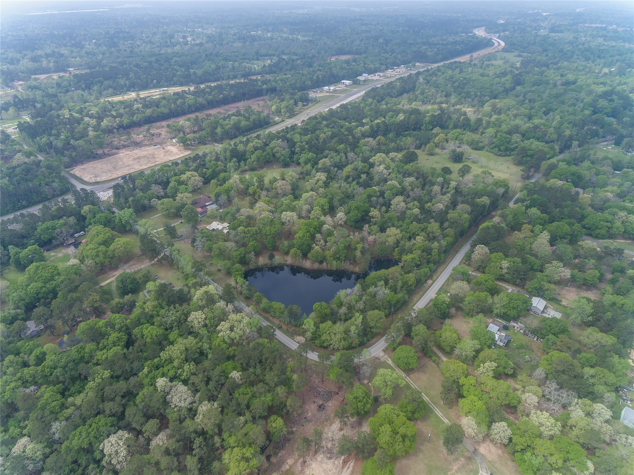 Tbd Tbd Firetower Road Conroe, TX 77306 - Photo 14 of 23 a view of a forest
