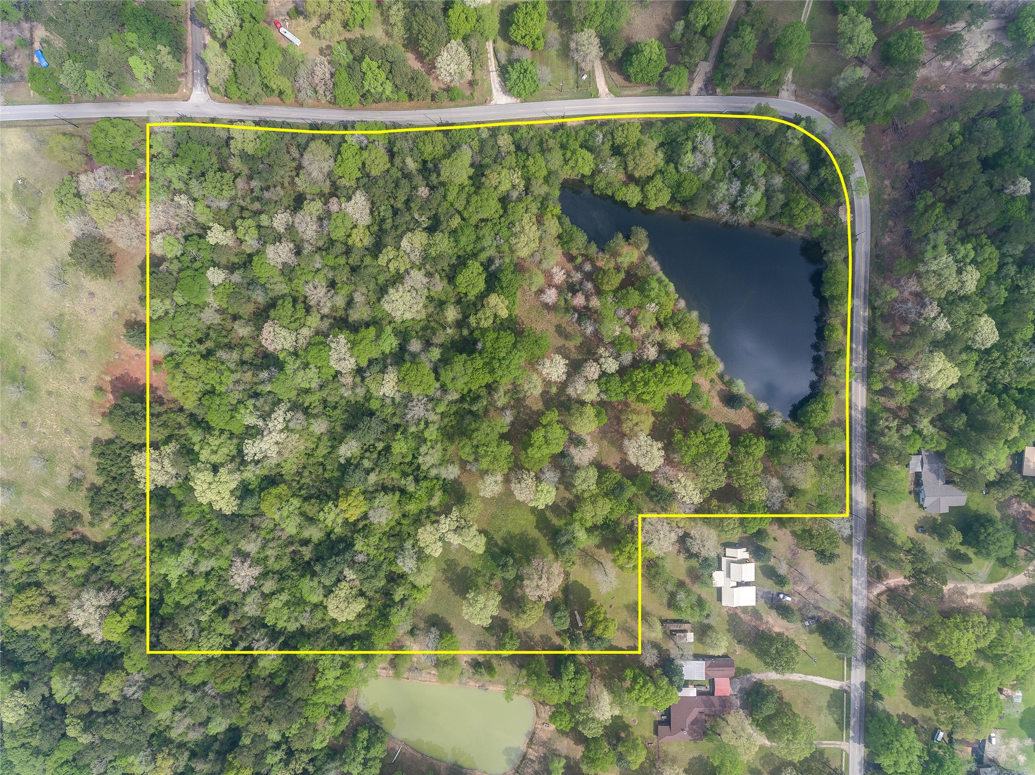 Tbd Tbd Firetower Road Conroe, TX 77306 - Photo 2 of 23 a view of a lake view