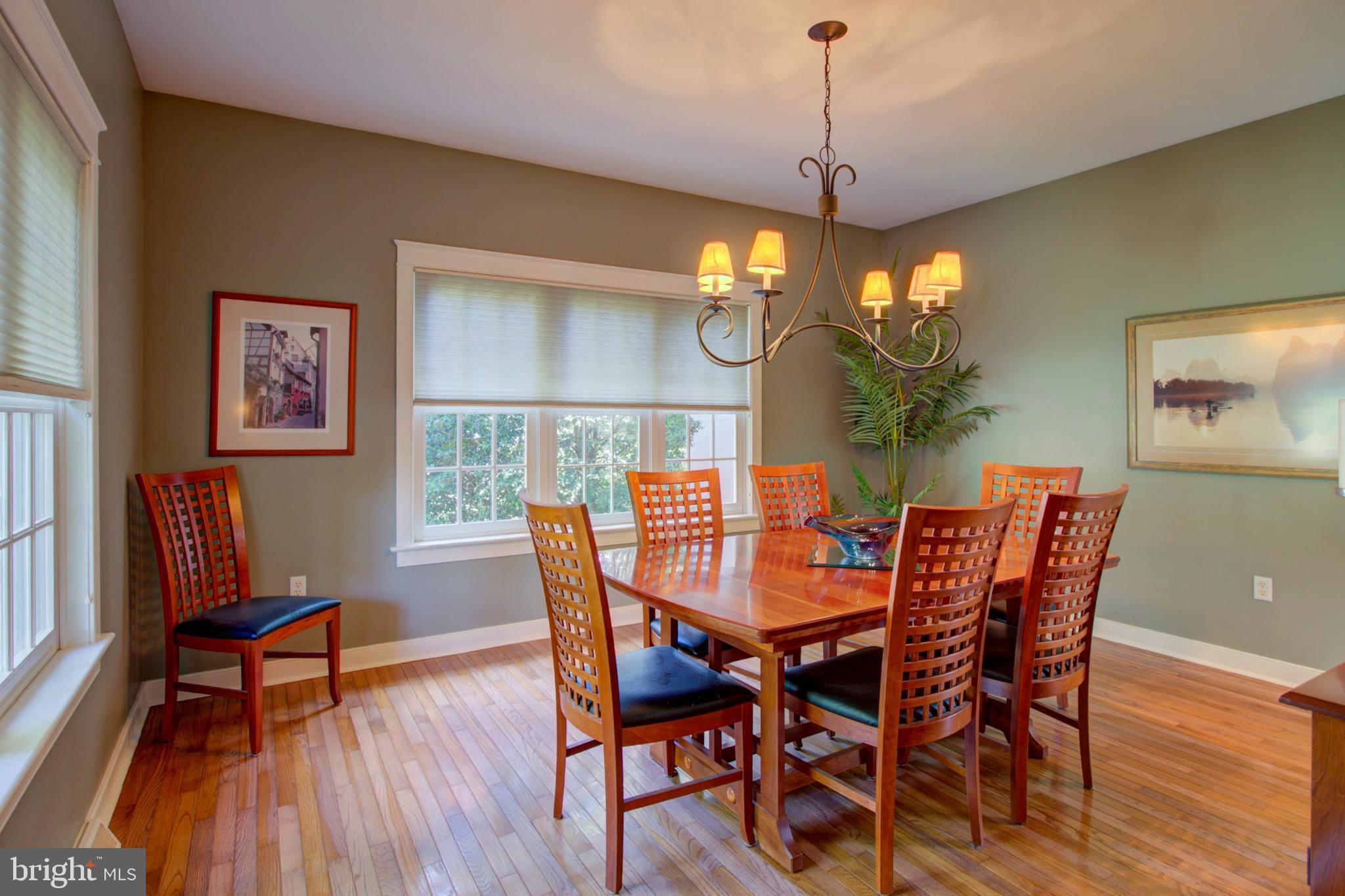 382 Rumford Road Lititz, PA 17543 - Photo 11 of 63 a dining room with furniture a chandelier and wooden floor
