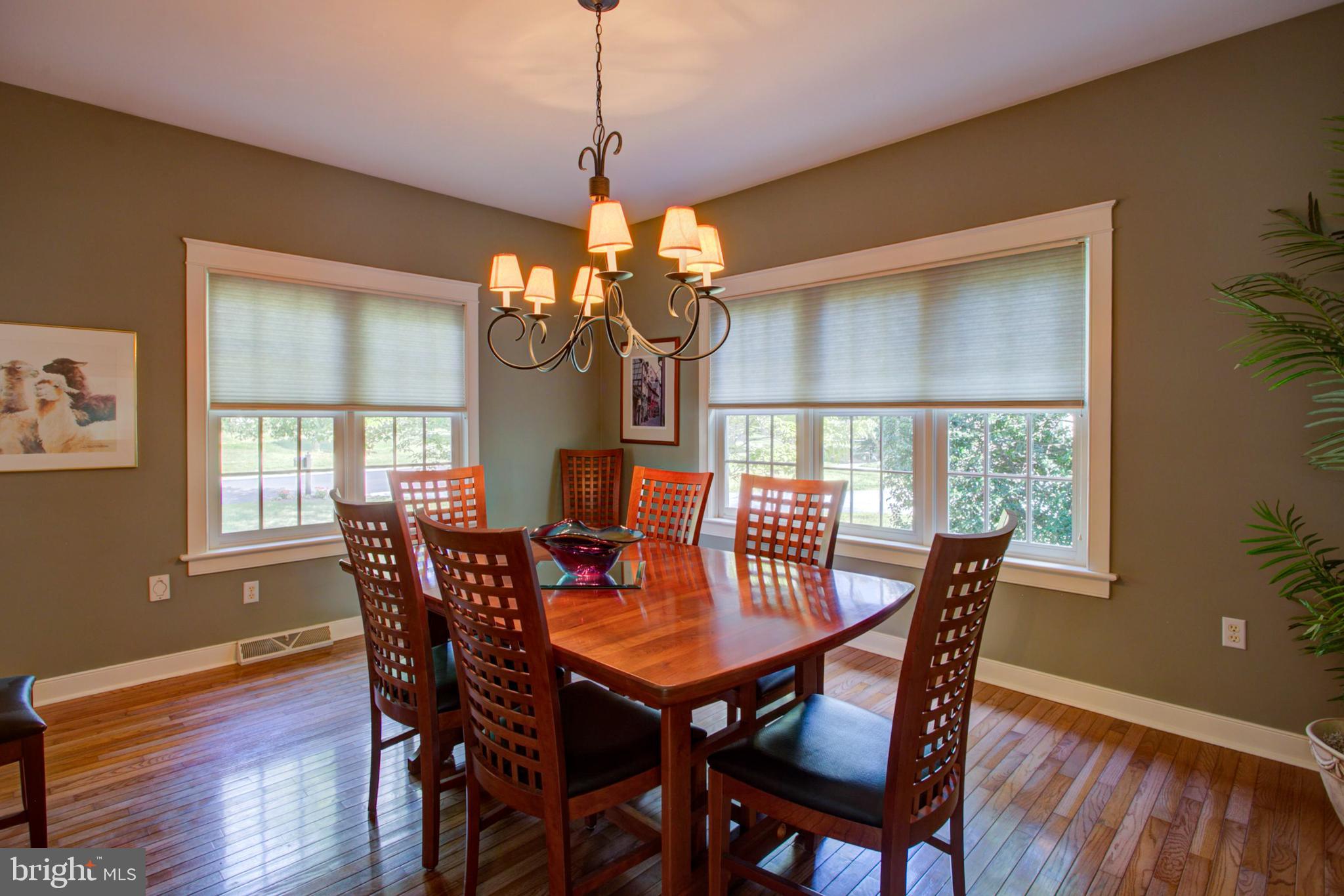 382 Rumford Road Lititz, PA 17543 - Photo 12 of 63 a view of a dining room with furniture window and wooden floor