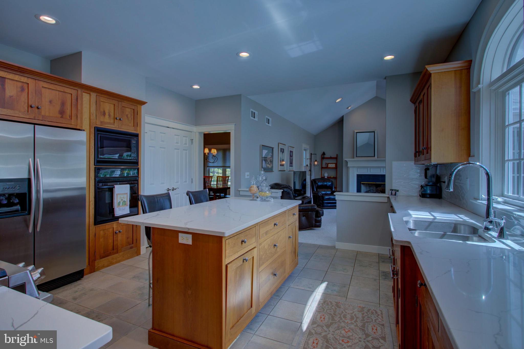 382 Rumford Road Lititz, PA 17543 - Photo 18 of 63 a large kitchen with stainless steel appliances granite countertop a large counter top a stove a sink and a refrigerator