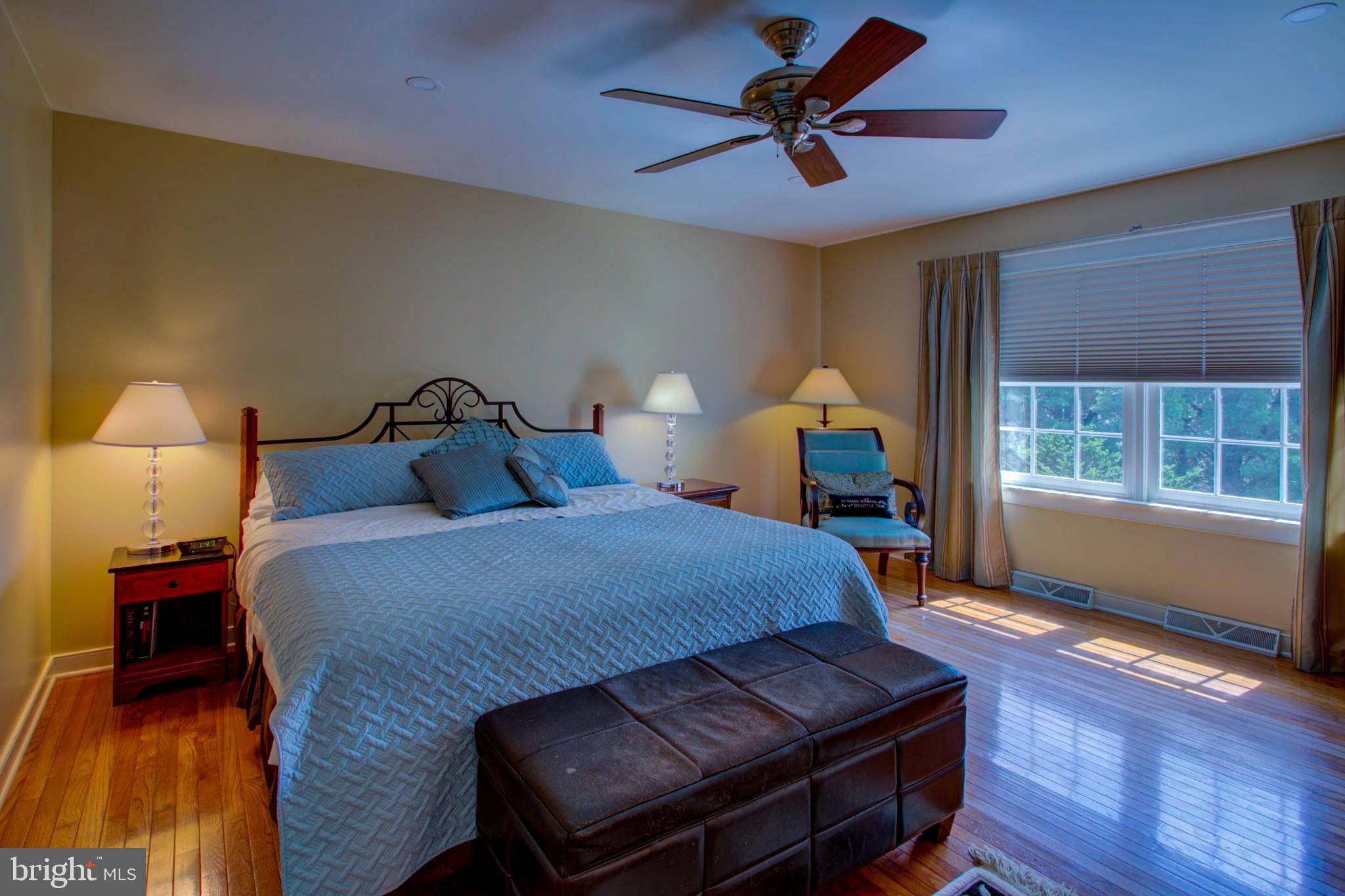 382 Rumford Road Lititz, PA 17543 - Photo 25 of 63 a bedroom with a bed and wooden floor