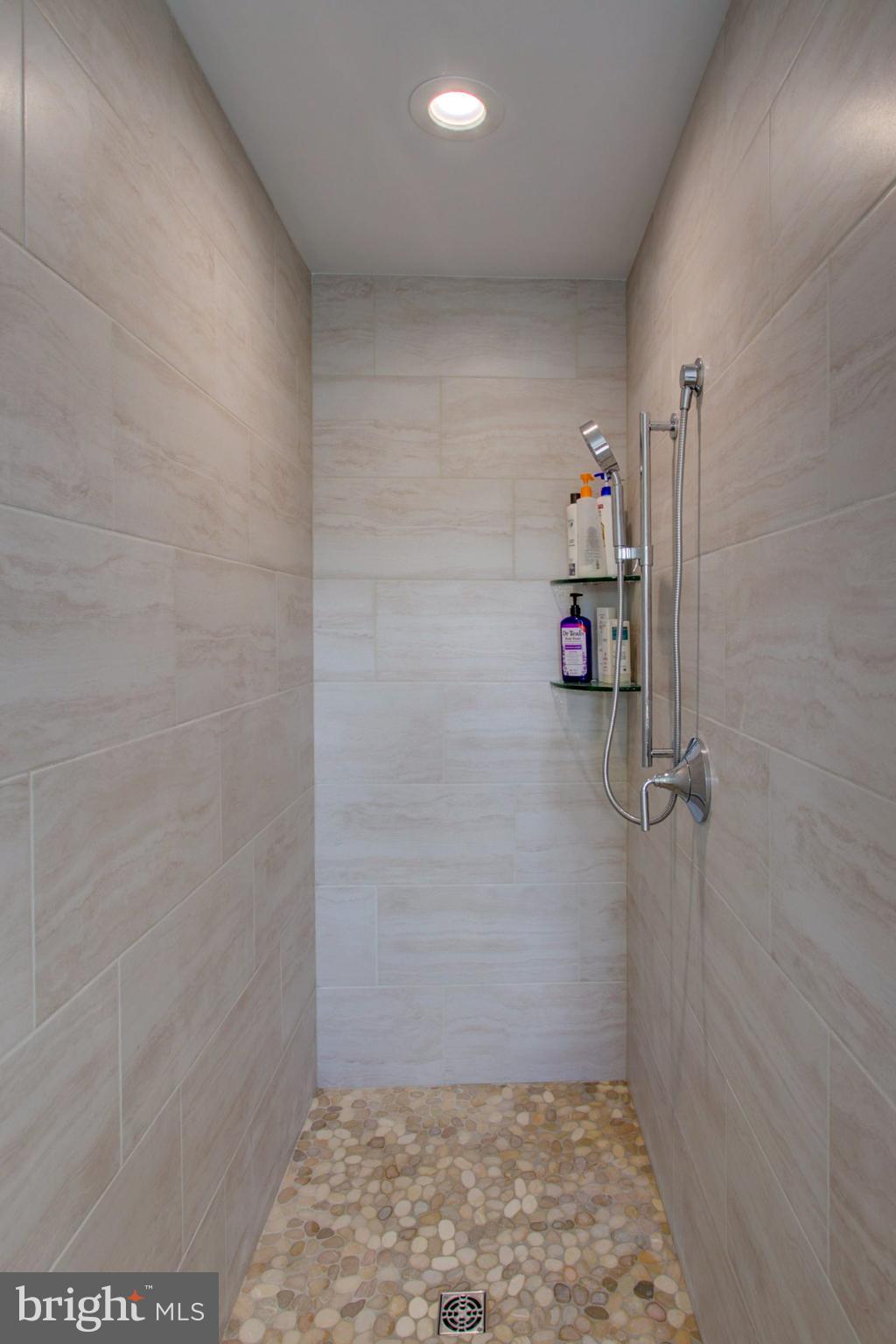 382 Rumford Road Lititz, PA 17543 - Photo 30 of 63 Primary Suite Tile Shower w/Pebbled floor