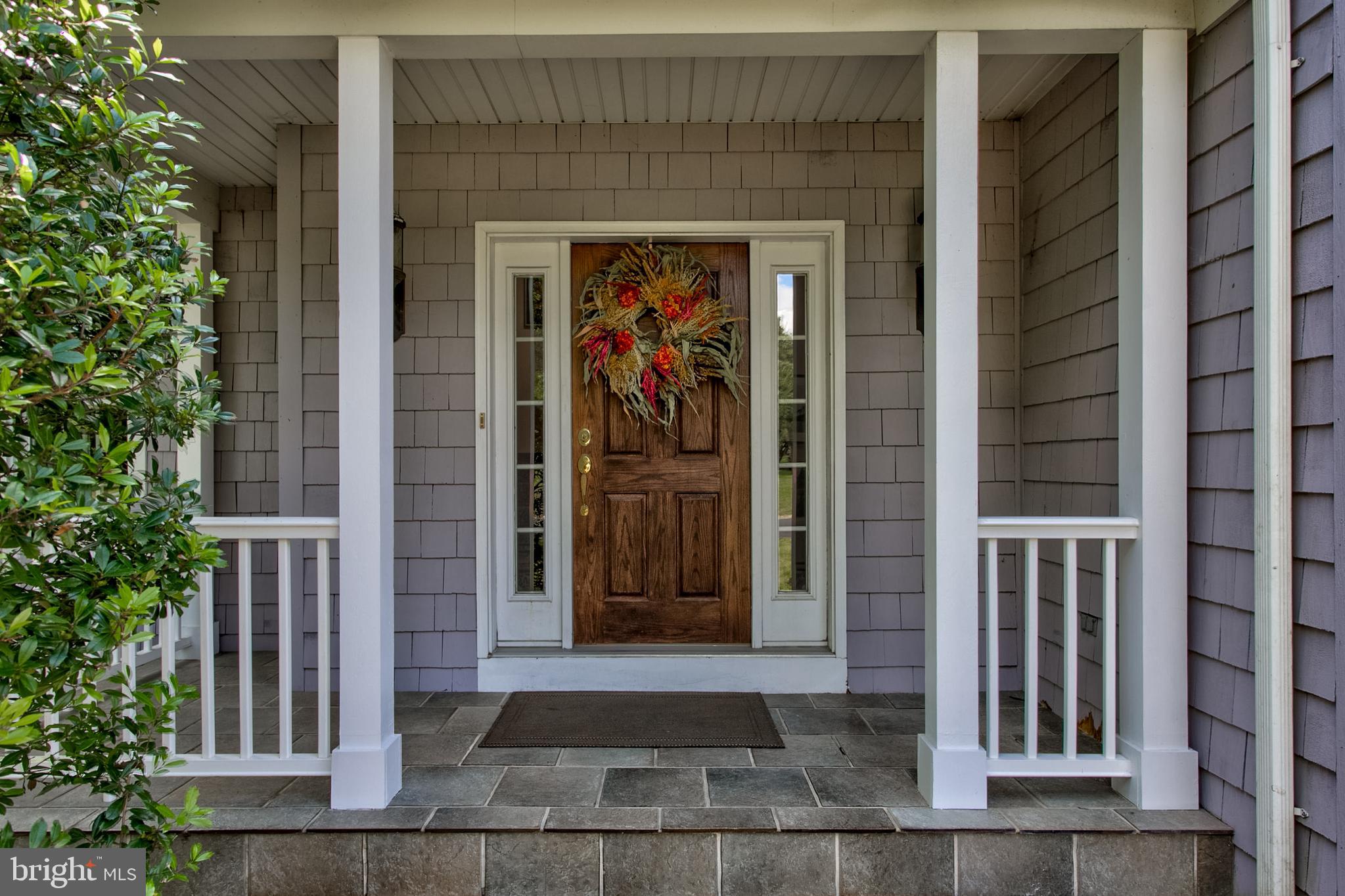 382 Rumford Road Lititz, PA 17543 - Photo 3 of 63 a front view of a house with a porch