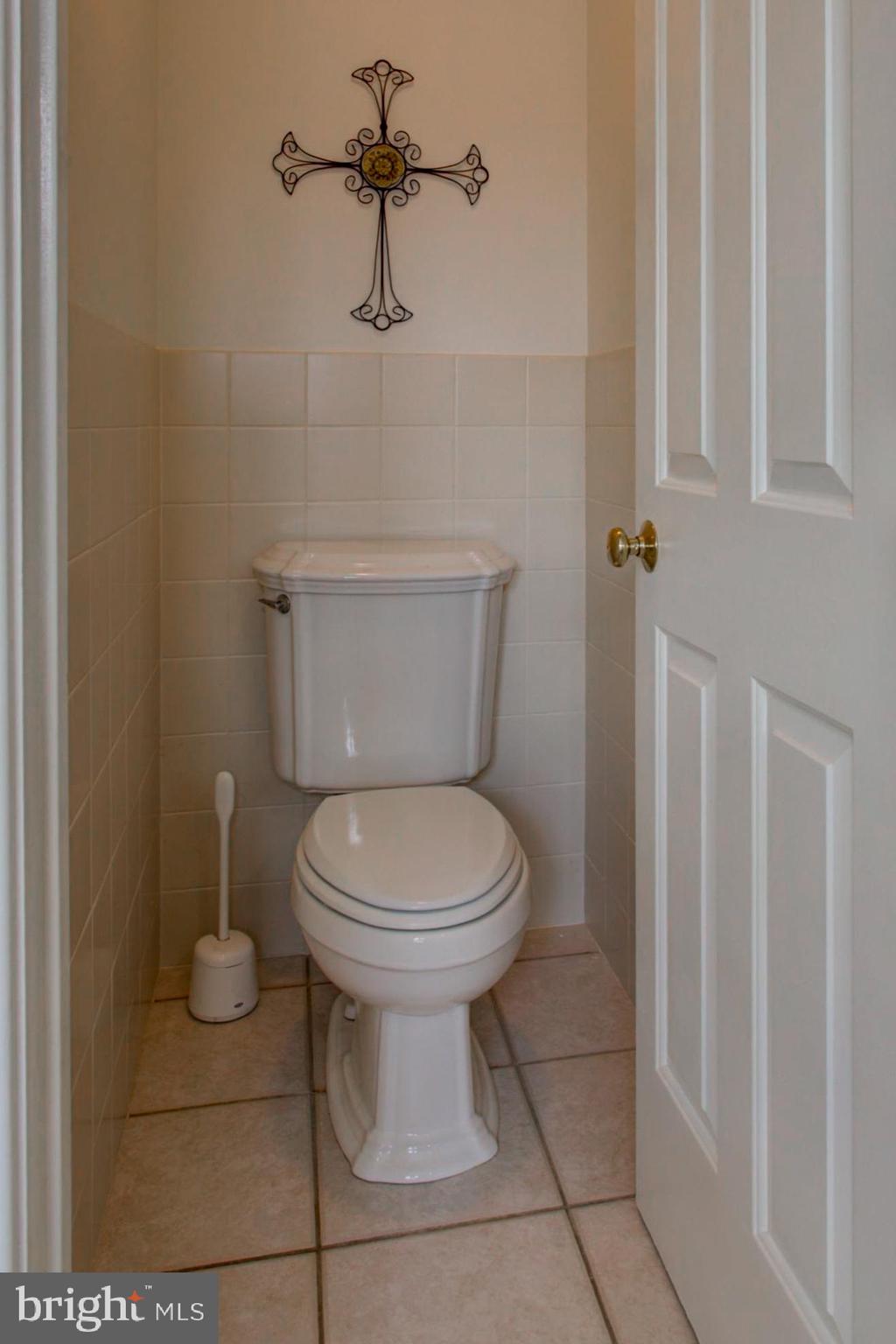 382 Rumford Road Lititz, PA 17543 - Photo 31 of 63 a bathroom with a toilet and a rug
