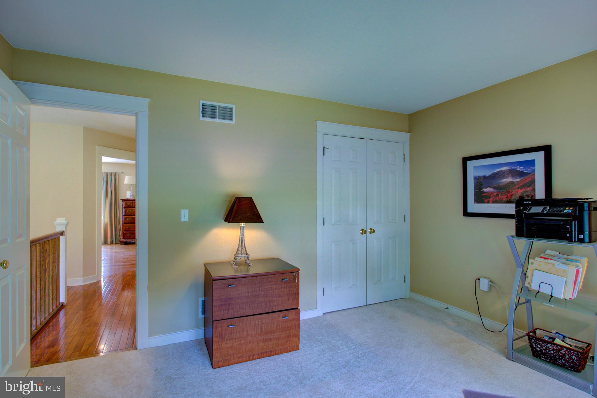 382 Rumford Road Lititz, PA 17543 - Photo 36 of 63 a bed room with furniture and a flat screen tv