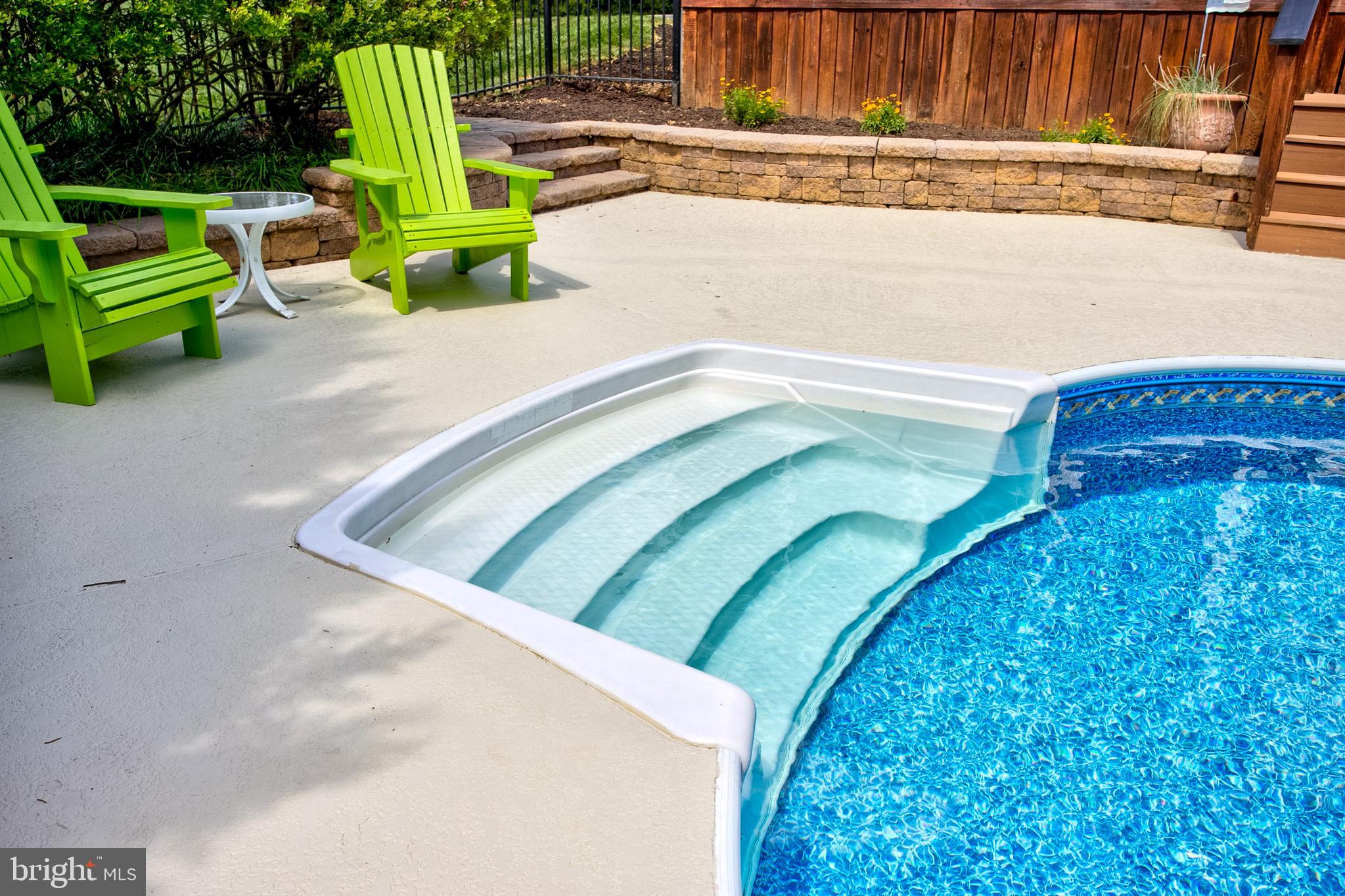 382 Rumford Road Lititz, PA 17543 - Photo 43 of 63 a view of a swimming pool with a backyard and trees