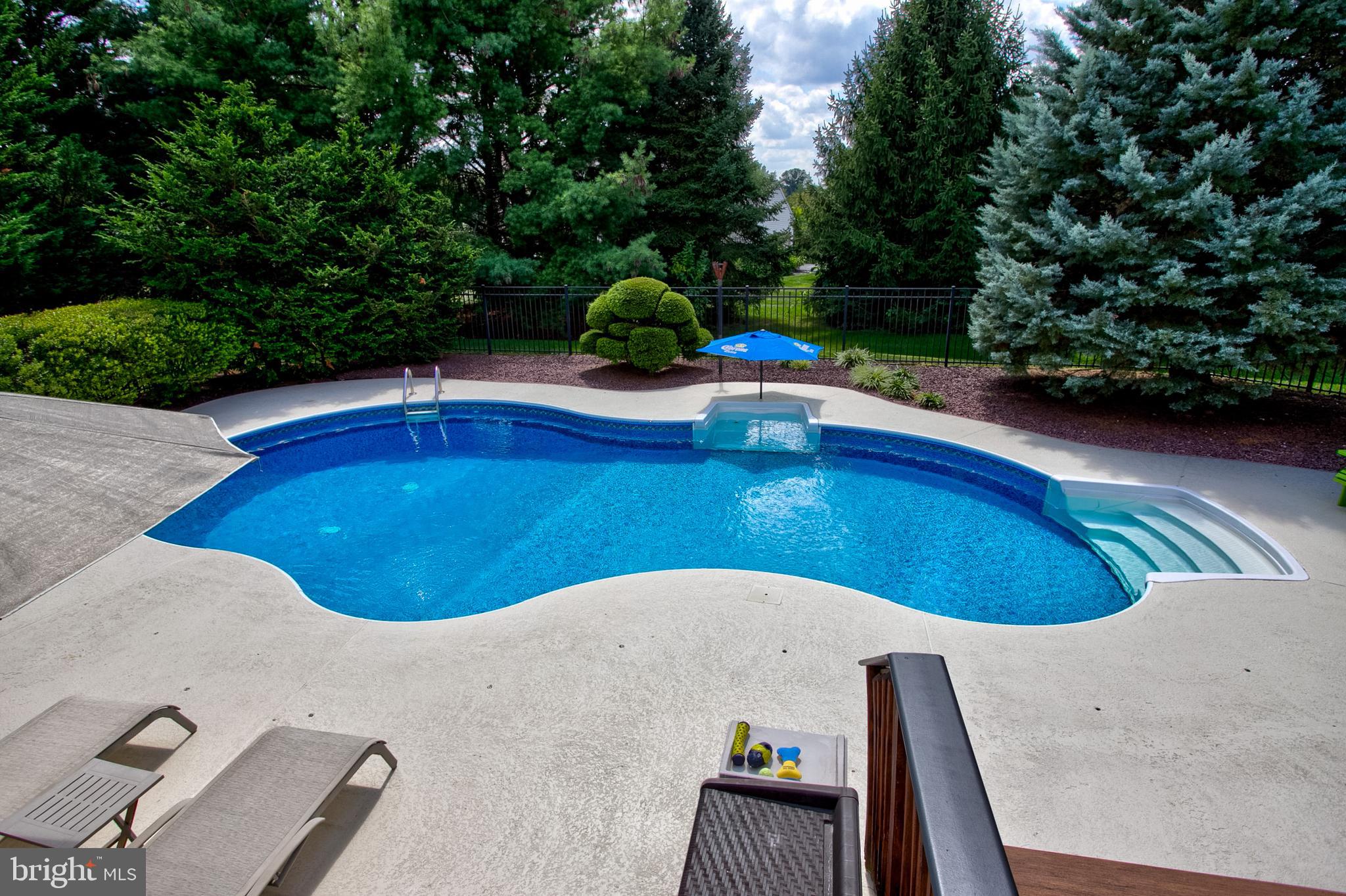382 Rumford Road Lititz, PA 17543 - Photo 44 of 63 a view of a swimming pool with a patio