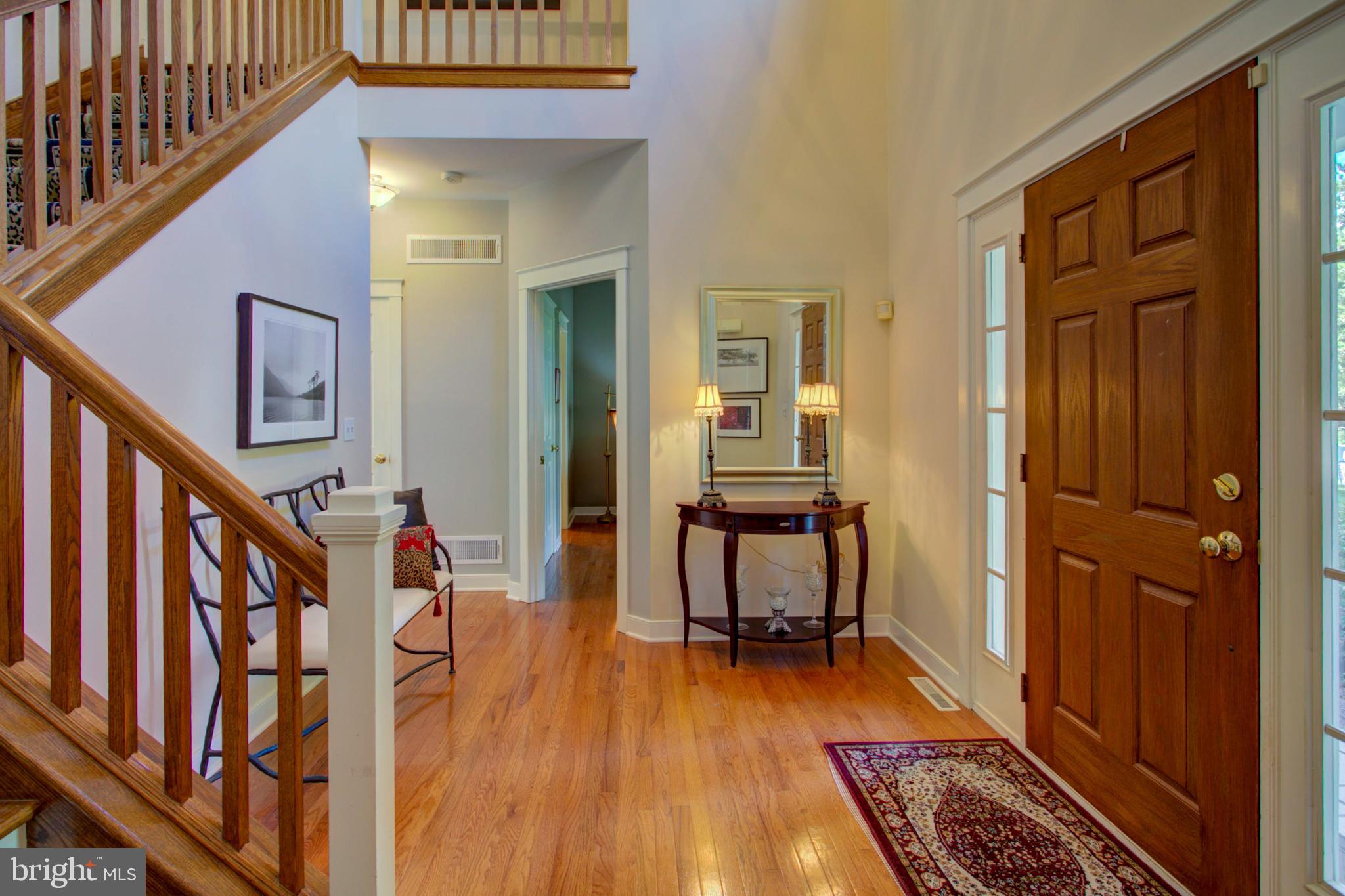 382 Rumford Road Lititz, PA 17543 - Photo 5 of 63 a view of a hallway with wooden floor and stairs