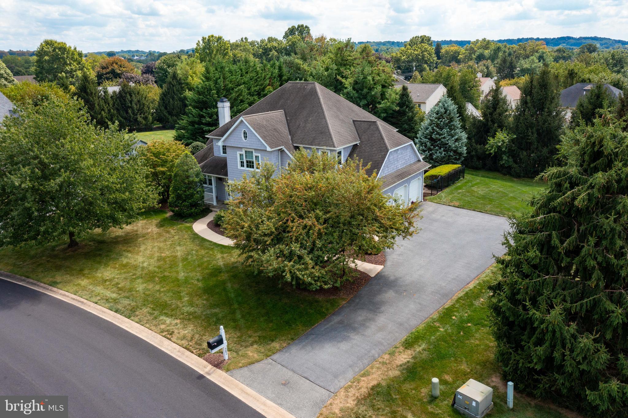382 Rumford Road Lititz, PA 17543 - Photo 51 of 63 a aerial view of a house with a yard and large trees