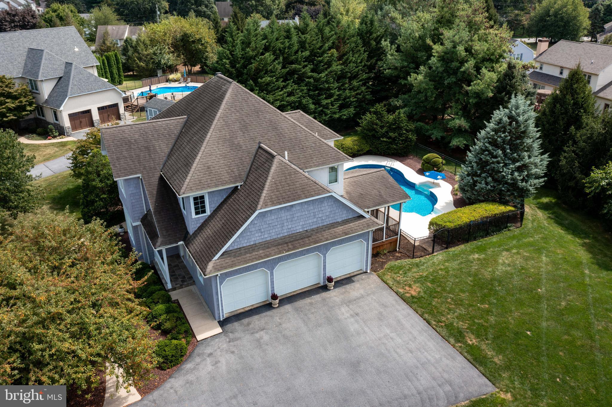 382 Rumford Road Lititz, PA 17543 - Photo 52 of 63 an aerial view of a house with swimming pool and outdoor seating