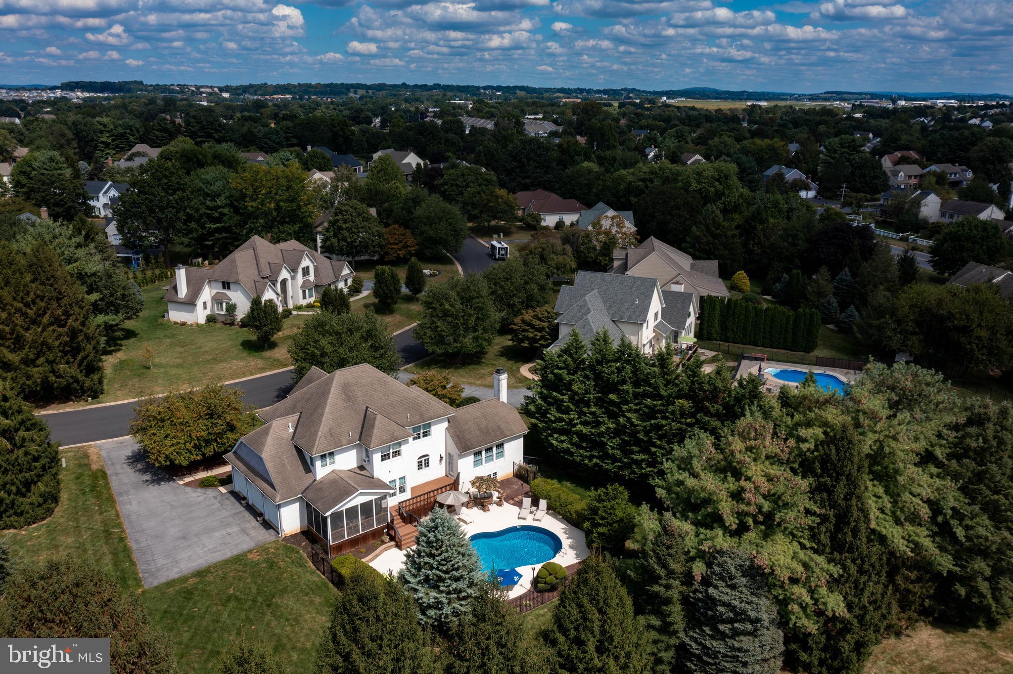382 Rumford Road Lititz, PA 17543 - Photo 54 of 63 an aerial view of a house with a yard and lake view