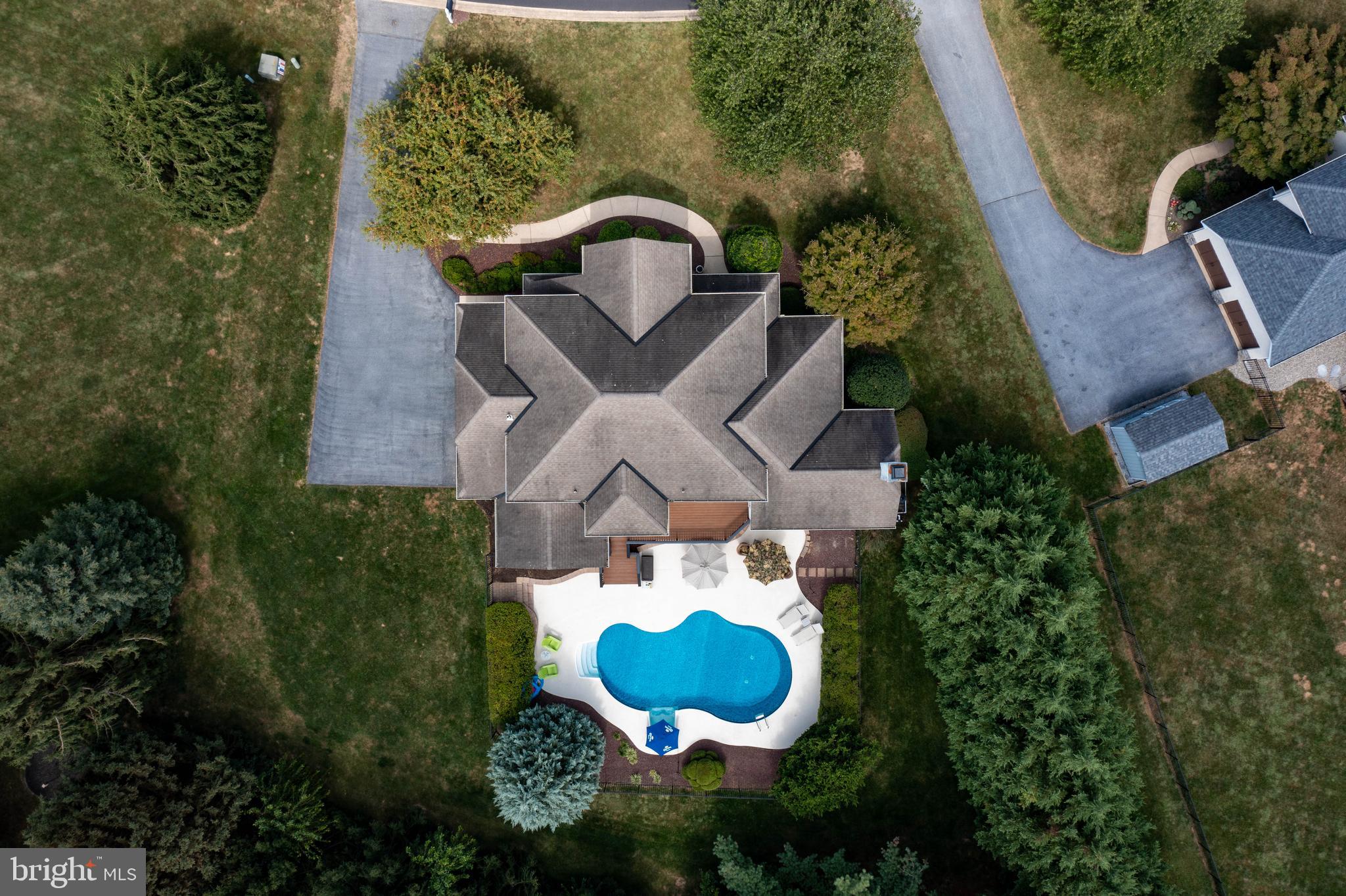 382 Rumford Road Lititz, PA 17543 - Photo 55 of 63 an aerial view of a house with garden space and trees all around