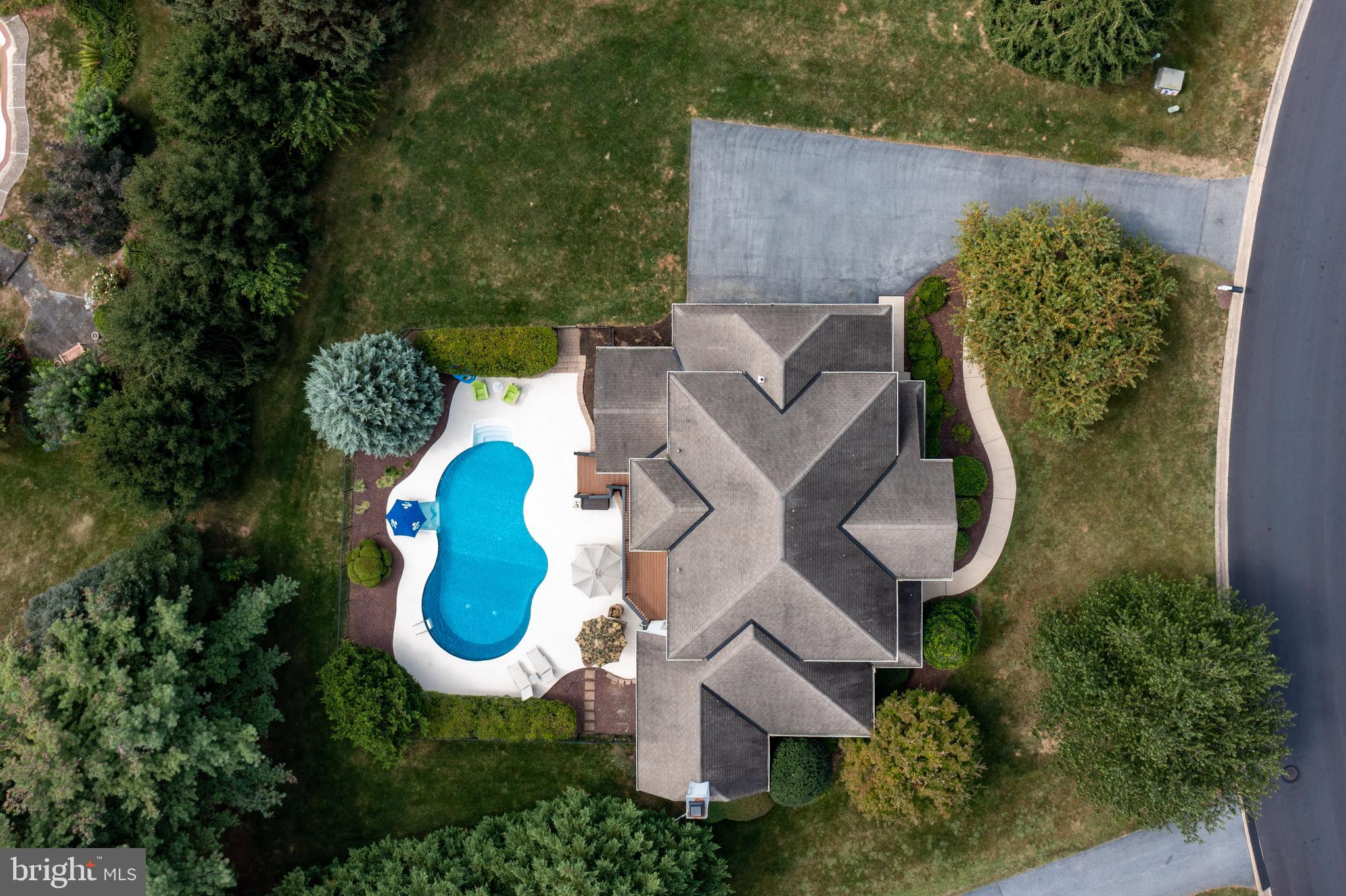 382 Rumford Road Lititz, PA 17543 - Photo 56 of 63 an aerial view of a house with garden space and swimming pool