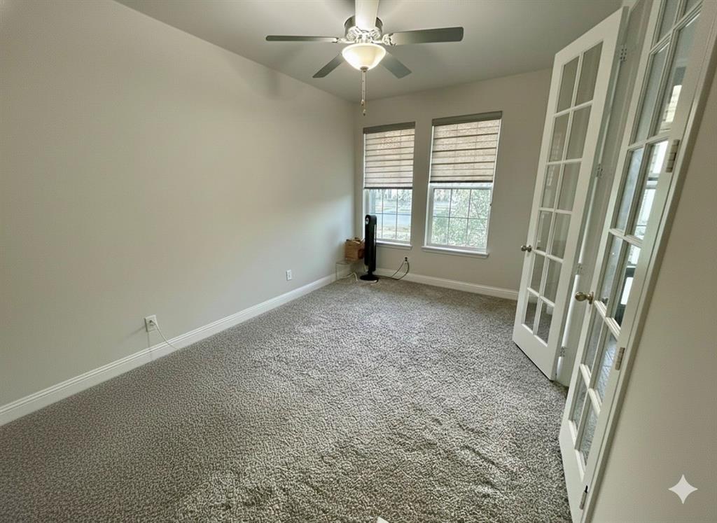 6842 Albany Park Frisco, TX 75034 - Photo 10 of 21 an empty room with windows and fan