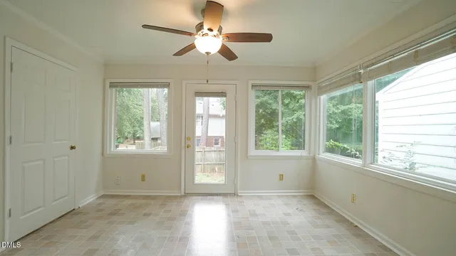 a view of an empty room with a window