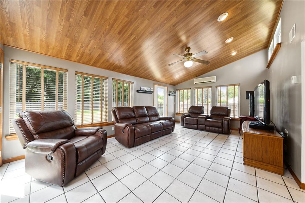 116 Buttercup School Road Renfrew, PA 16053 - Photo 20 of 34 a living room with furniture and a flat screen tv