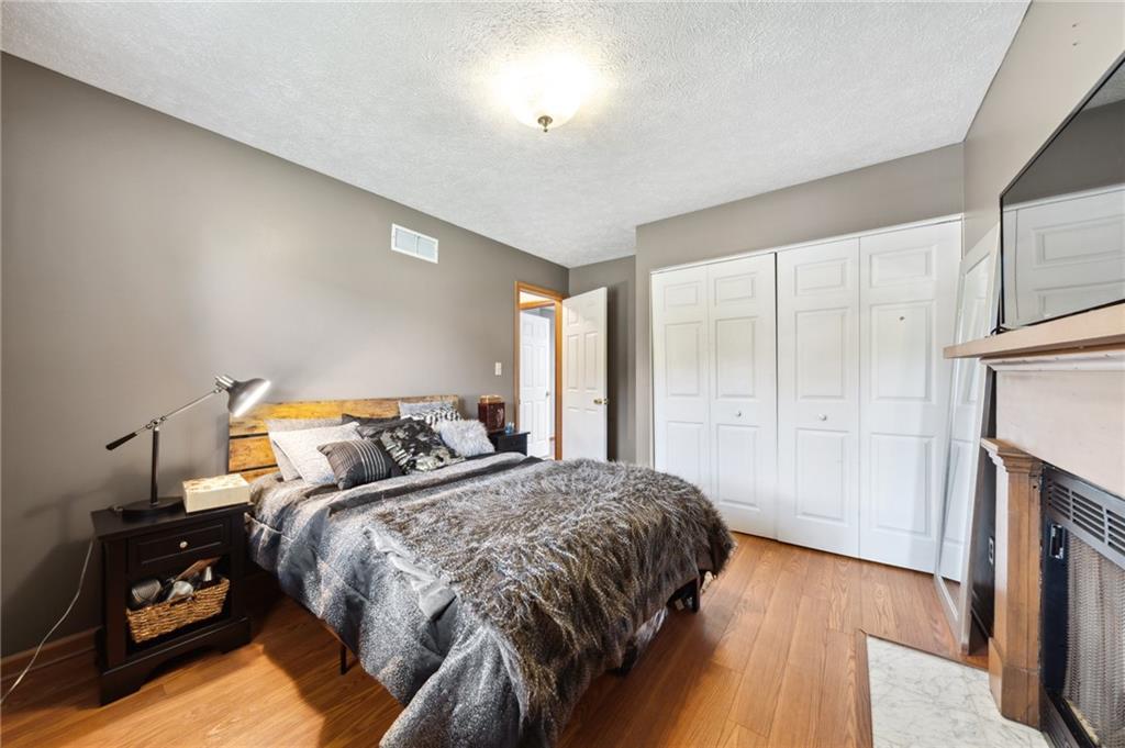 116 Buttercup School Road Renfrew, PA 16053 - Photo 27 of 34 a bedroom with a bed and a tv