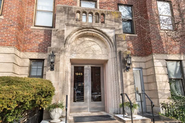 a view of a house with a iron stairs
