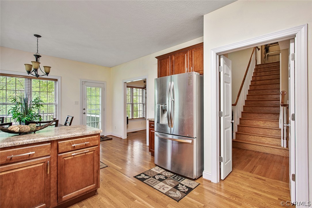 3001 Barnack Road Midlothian, VA 23112 - Photo 14 of 37 a kitchen with stainless steel appliances granite countertop a refrigerator and a sink