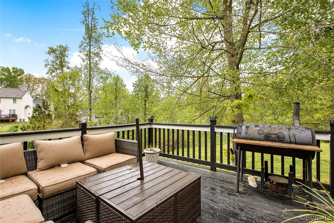 3001 Barnack Road Midlothian, VA 23112 - Photo 33 of 37 a balcony with wooden floor and outdoor seating