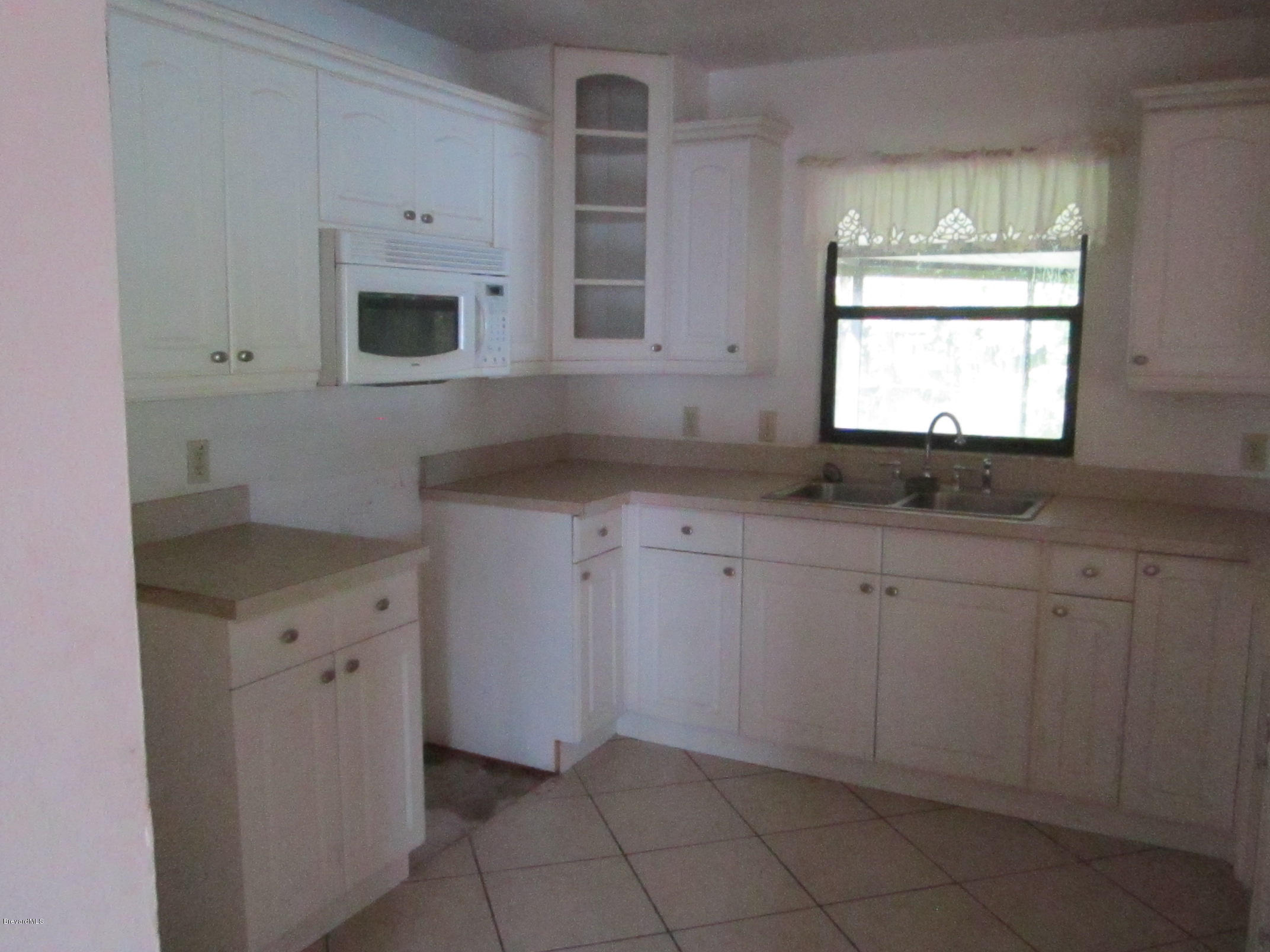 841 Raintree Avenue Rockledge, FL 32955 - Photo 2 of 4 IMG_1748