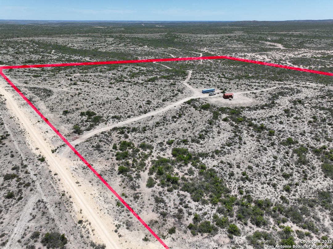 1935 Wolf Spgs Road Comstock, TX 78837 - Photo 14 of 15 a view of swimming pool with red and table