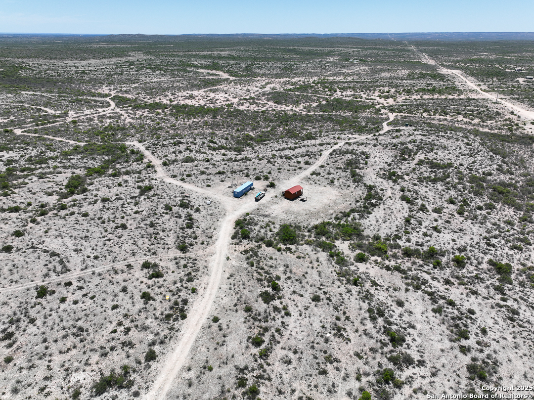 1935 Wolf Spgs Road Comstock, TX 78837 - Photo 6 of 15 a view of a city