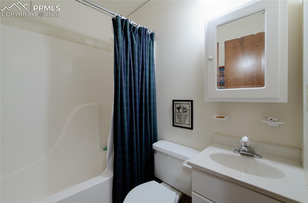 9455 Mohawk Trail Cascade, CO 80809 - Photo 17 of 33 Guest bath off hallway