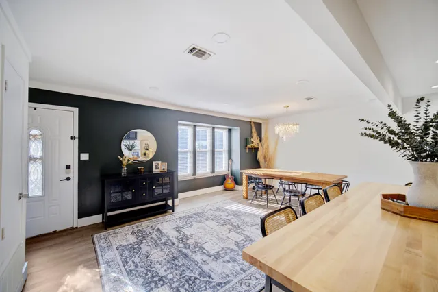 a view of a dining room kitchen with furniture and a table