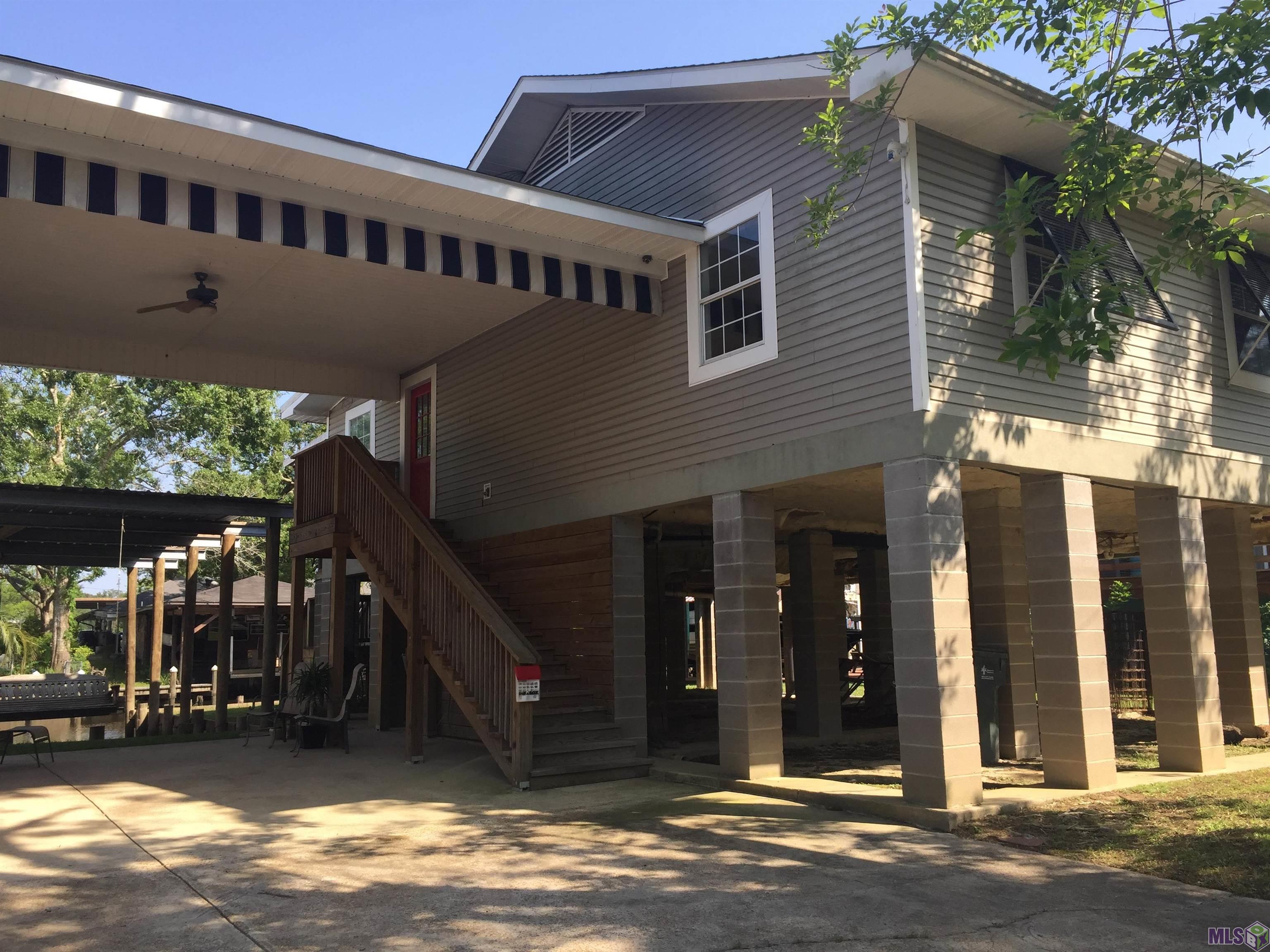 20320 Patricia Street Springfield, LA 70462 - Photo 1 of 28 Front view of camp