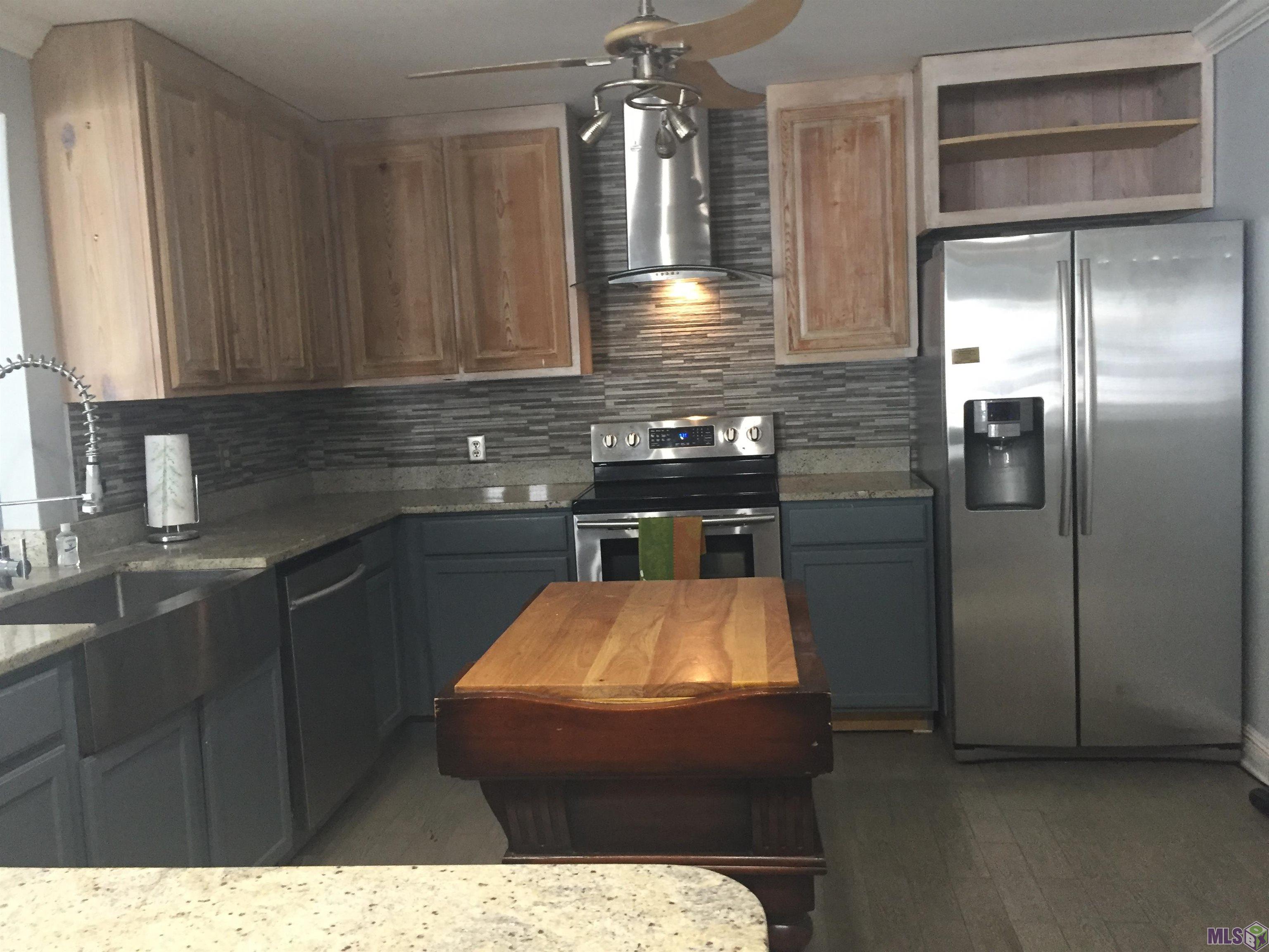 20320 Patricia Street Springfield, LA 70462 - Photo 13 of 28 Kitchen Comeplete with Stainless Stove Dishwasher & Refrige. Slab Granite and Barn Sink