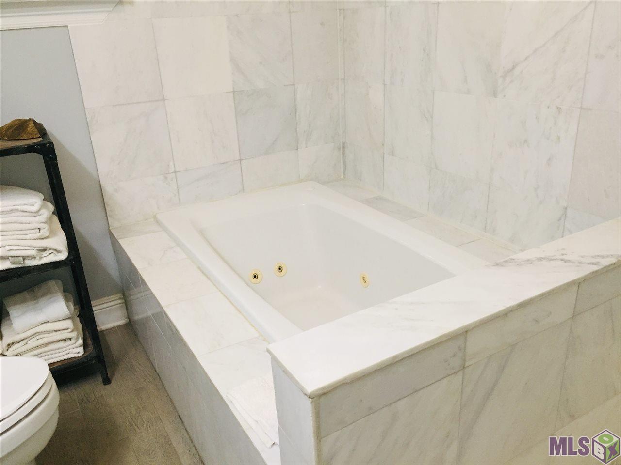 20320 Patricia Street Springfield, LA 70462 - Photo 19 of 28 Hall Bath With Jetted Tub and Separate Shower