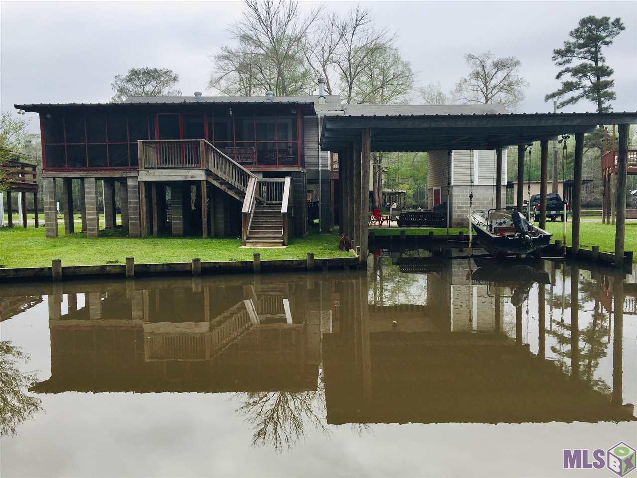 20320 Patricia Street Springfield, LA 70462 - Photo 23 of 28 View of back with Double Boat Port and newer Bulk Heading