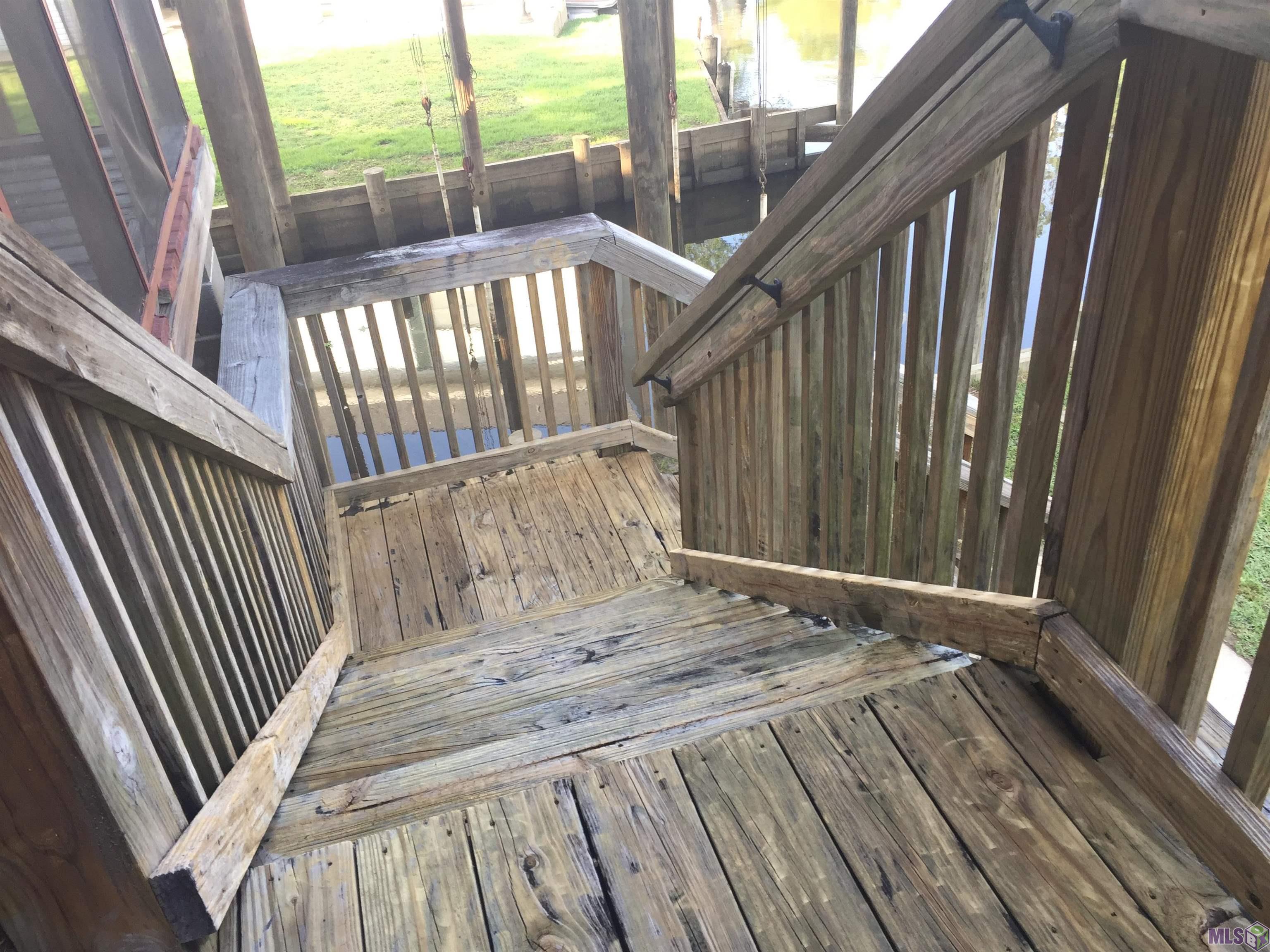 20320 Patricia Street Springfield, LA 70462 - Photo 25 of 28 Steps down to back yard
