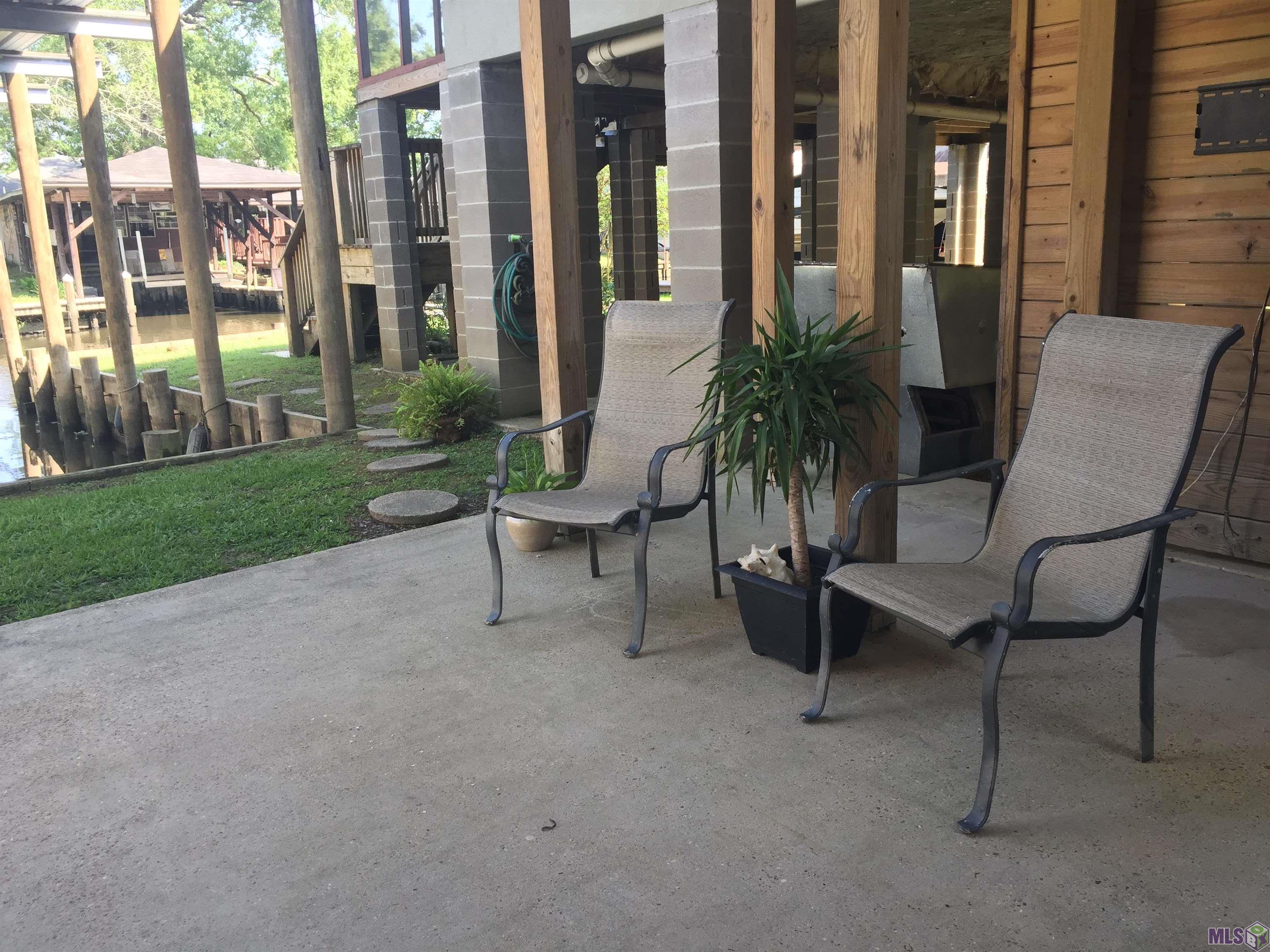 20320 Patricia Street Springfield, LA 70462 - Photo 4 of 28 A place to relax on the patio