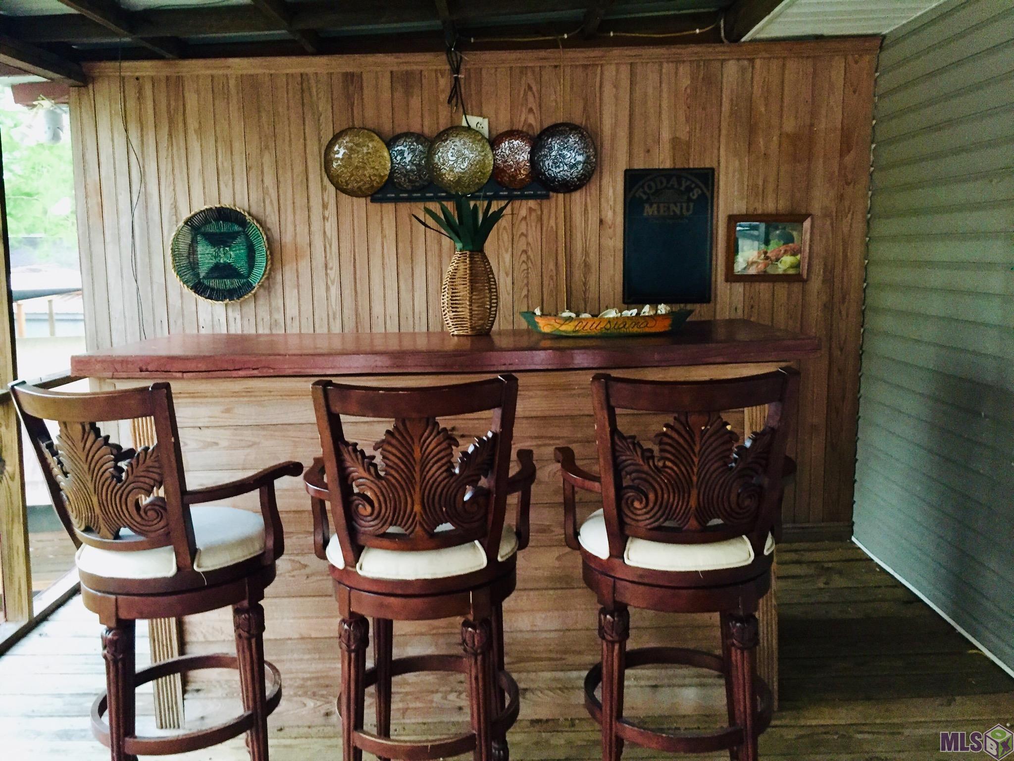 20320 Patricia Street Springfield, LA 70462 - Photo 6 of 28 Built-in Bar on Screened Porch