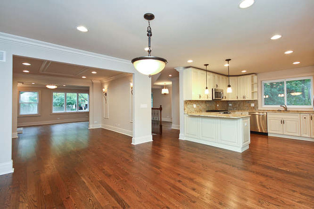 1035 Willow Road Winnetka, IL 60093 - Photo 13 of 25 a view of a kitchen with a refrigerator and a stove top oven