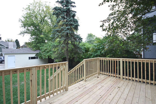 1035 Willow Road Winnetka, IL 60093 - Photo 25 of 25 a view of wooden deck and a yard