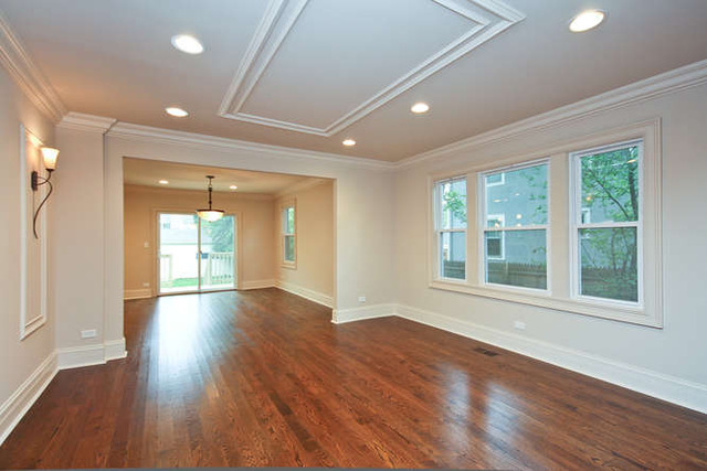 1035 Willow Road Winnetka, IL 60093 - Photo 10 of 25 a view of empty room with wooden floor and fan